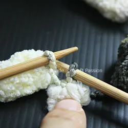 Learn how to knit a scarf that's super soft and warm with Pom Pom yarn. It is a quick project and you only need to know how to do the knit stitch.