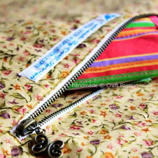 Pattern and tutorial on how to sew zipper pocket for bag and purse. A must-know tutorial if you love to sew a purse or bag.