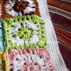 Single crochet on the bottom hem of granny square top