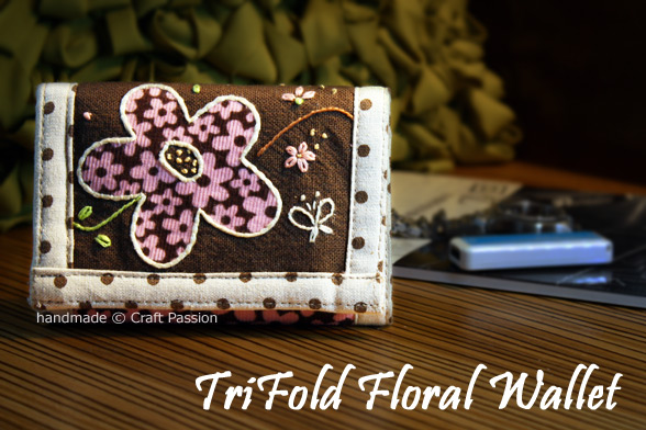 Free pattern & tutorial to sew a trifold wallet. Demo with a floral print fabric but you may adapt the method to sew a men wallet the similar way.