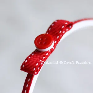 Attach button on ribbon bow