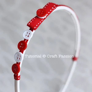 Decorate headband with ribbon and button