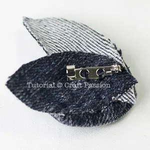 back of denim rosette brooch