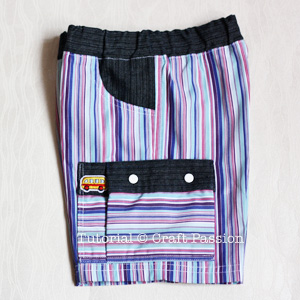 cargo pocket with prong snap button