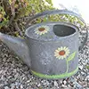 stenciled watering can DIY paint projects