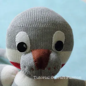 sock lion button eyes