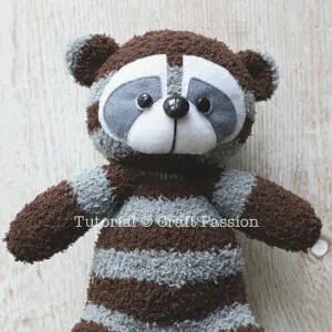 sewing sock raccoon