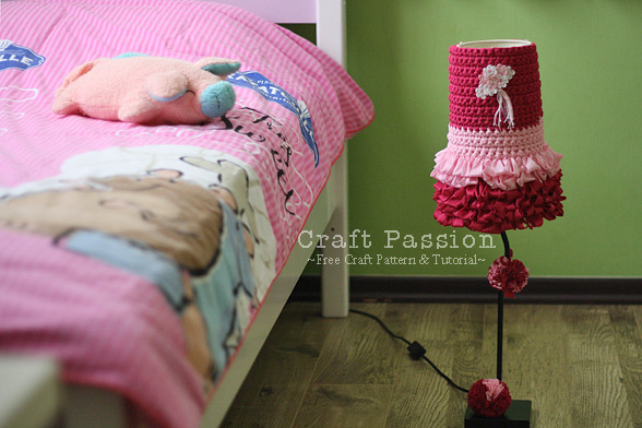 Transform the appearance of an outdated lamp by creating a stylish new crochet lampshade cover for it.