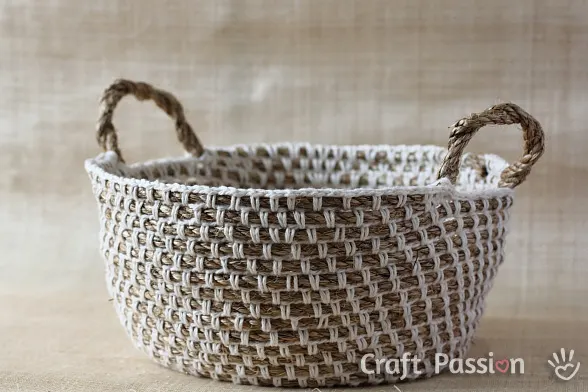 Make your own hemp basket with this crochet basket pattern & tutorial. Know basic crochet technique to complete it. It uses manila rope and yarn to build.