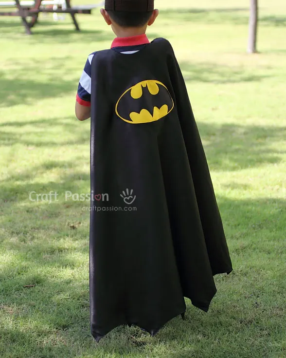 Create a Batman superhero cape with this easy cape sewing pattern in just one evening, featuring an inverted scallop bat wing hem.