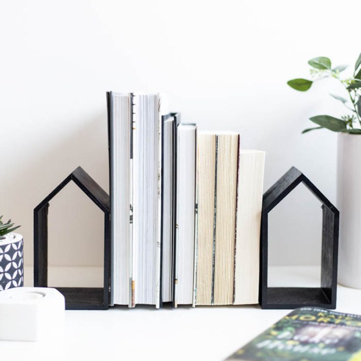 Grab 2 of these dollar store wooden houses for a quick and simple craft of stylish DIY bookends that everyone can make. Ensured to bring a minimalistic and homey touch to your bookshelves while keeping your books organized.