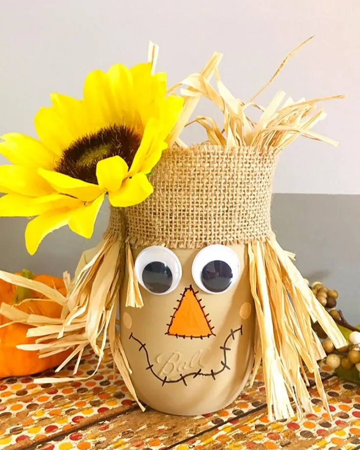 Boo! Whether it's Halloween or not, this cute scarecrow is suitable for all occasions! The added sunflower gives the craft a touch of nature, making it realistic. We love how you can reuse it for Halloween as well!