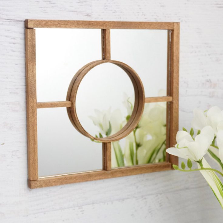 A simple wooden framed mirror is sure to bring an artsy unique touch into your home rather than a plain mirror. Hang it in your foyer so you can do those last minute touch ups right before you leave the house.