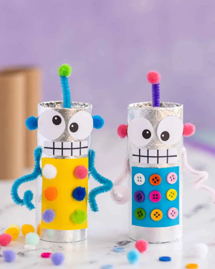 Get futuristic with these robot toilet paper roll crafts! Wrap the rolls with aluminum foil, then add buttons, dials, and pipe cleaner antennas. Let your imagination run wild as you create your own unique robot designs.