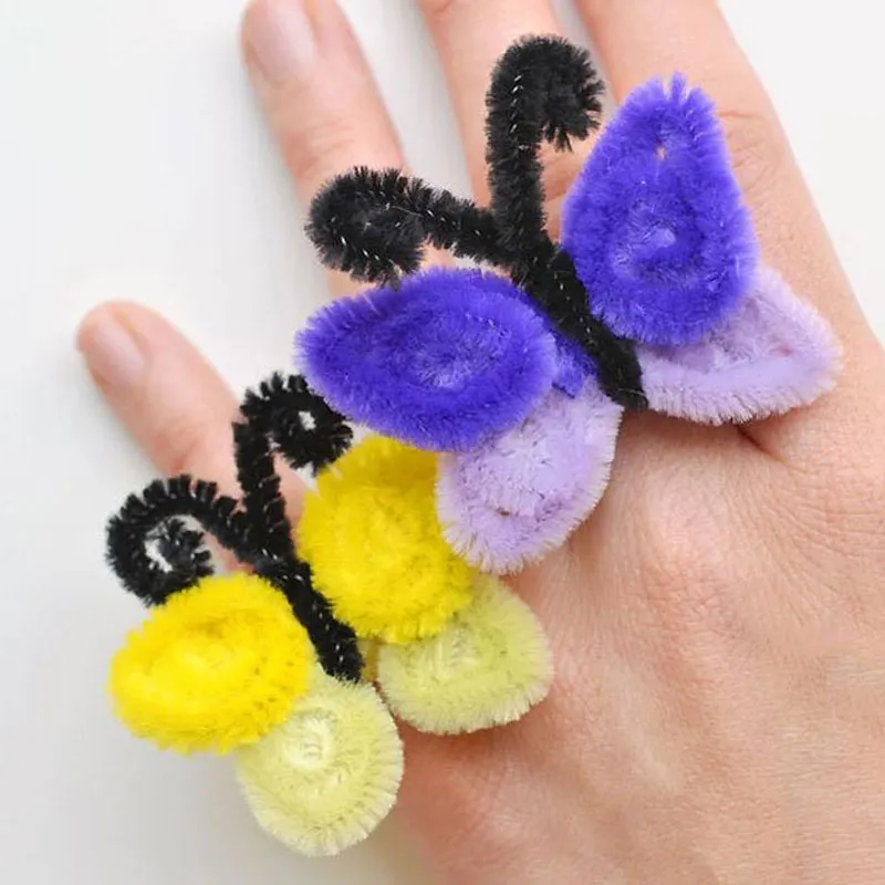 These colorful fuzzy butterflies are perfect for springtime decorations or as a fuzzy addition to greeting cards and gifts. Experiment with different colored pipe cleaners while following this simple guide!