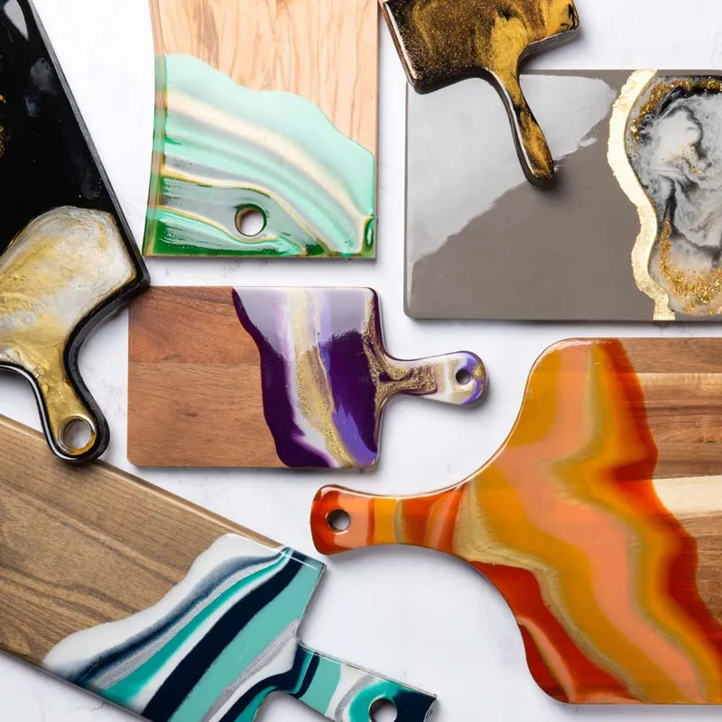 Besides serving trays, resin can make cutting boards due to their durability. If you don't want the board to accumulate scratches, use it as a resin charcuterie board. An intermediate level is required for this resin craft.