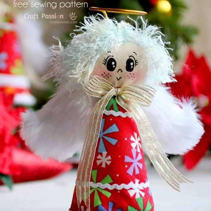 Create your own festive Christmas Angel Ornament with this easy-to-follow tutorial and free pattern. Personalize it with your choice of fabrics, trims, and hair to make a unique decoration for your tree or home!