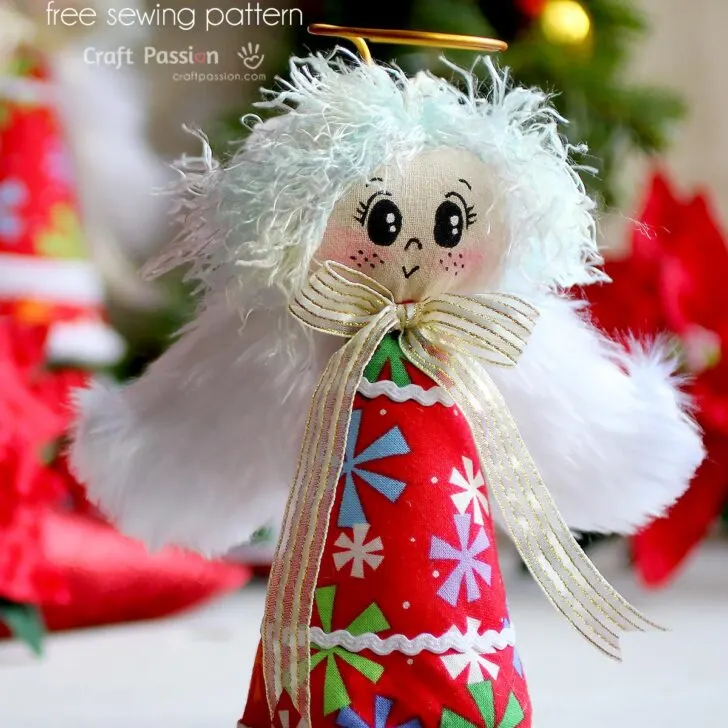 Create your own festive Christmas Angel Ornament with this easy-to-follow tutorial and free pattern. Personalize it with your choice of fabrics, trims, and hair to make a unique decoration for your tree or home!