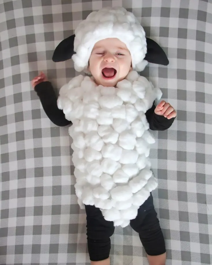 Snuggle your little ones in this adorable costume that is fluffy, easy to make, and will surely charm everyone's hearts in this costume. Get ready for a woolly Halloween!