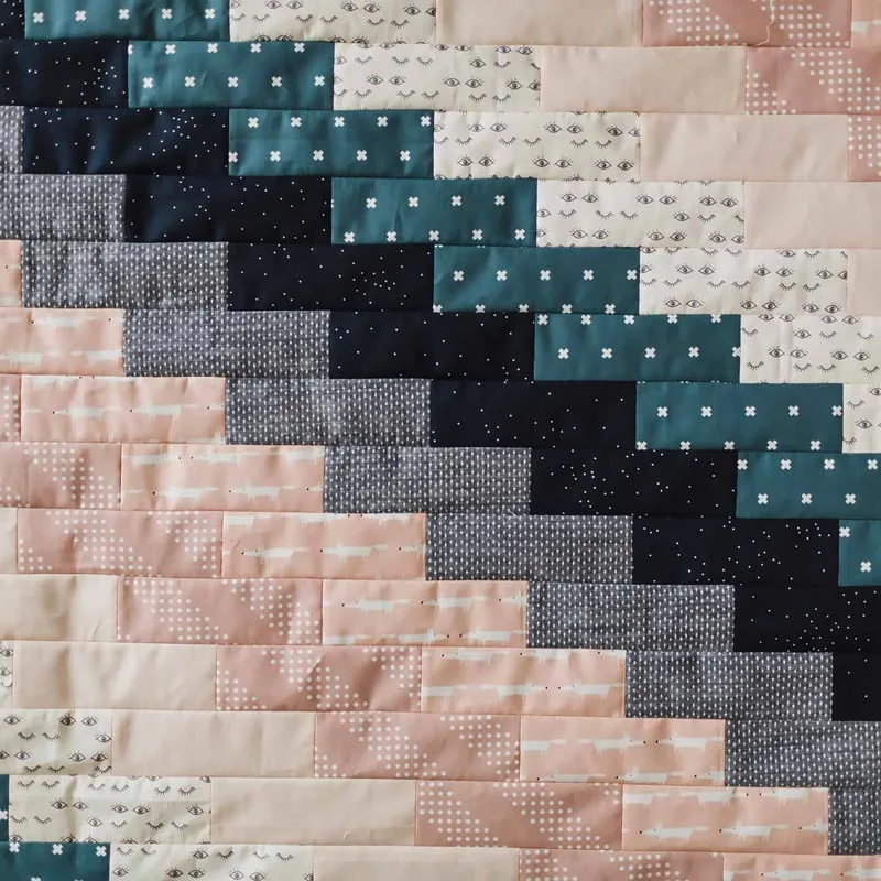 Don't you just love how refreshing this fat-quarter-friendly quilt is? It's a 42" x 42" crib quilt, an effortless project that is ideal for beginners. It comes together quickly; just select your favorite FQ fabric prints and mix and match them away for a personalized look.&nbsp;