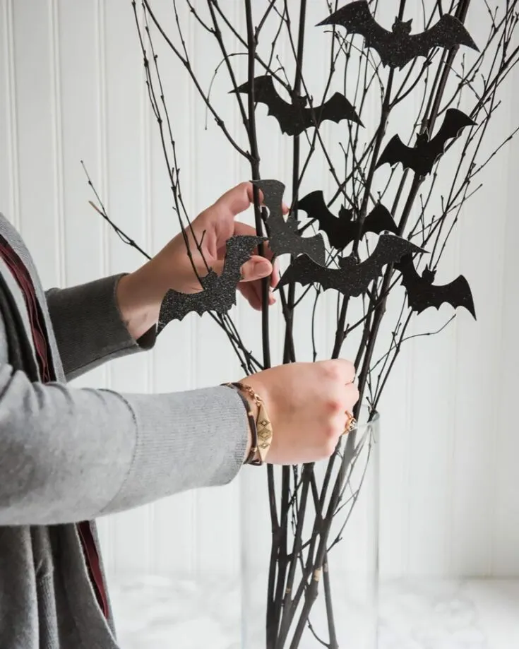 Try out these Halloween Bat Branches! Add a spooky touch to your home by following the tutorial below. It is an easy craft, as the bats are easily cut out using minimal effort!