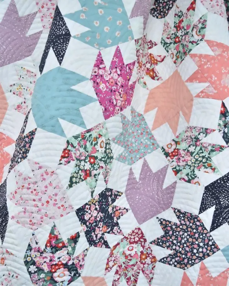 Finally, the last free pattern on this list is the Bear Tracks quilt! Whether you're going on a cabin getaway or a road trip, this quilt promises comfort and full of adorableness. This 60" x 72" throw quilt uses 15 fat quarters and has mismatched paws in different directions for a quirky visual effect.