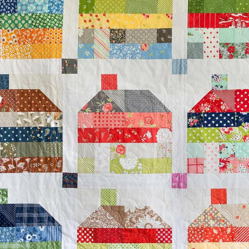 Build a house with this fantastic scrappy quilt project! Rather than a conventional design, this pattern offers a fun twist to a scrappy look. It's perfect for cabin getaways as you cozy up by the fireplace and measures approximately 96.5" x 102.5".&nbsp;