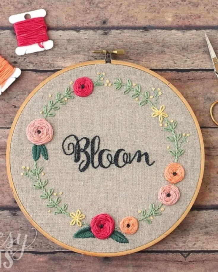 This cute design is easy and takes only a couple of hours to complete. The flowers are made of woven wheel stitches and the French Knot stitch.