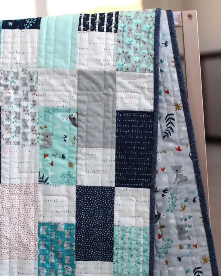Learn how to make this scrappy and cute Bricks Baby Quilt by clicking the link below! It's such a fun quilt because you get to show off your favorite cute fabrics that are put together into this crib-sized 42" x 54" quilt. Just remember to use a lot of contrasting blues to make it pop!