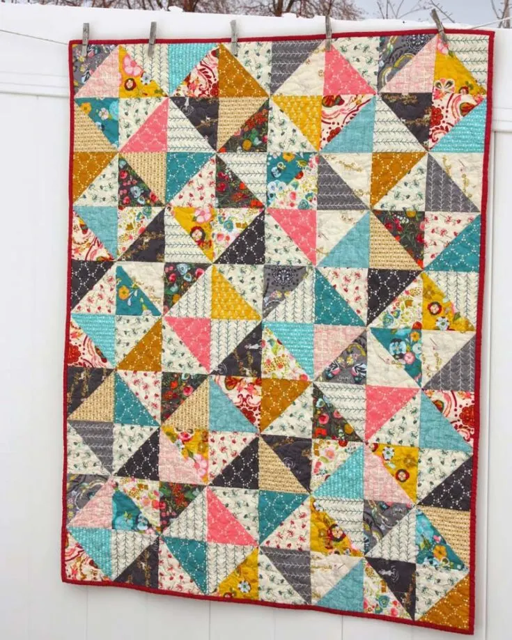 Learn how to make a scrappy quilt with the Broken Dishes tutorial. It incorporates a simple half-square triangles (HSTs) layout and is perfect for showing off those pretty scrap fabric collections. It also results in such a lovely graphic design. It comes in two sizes as follows: Crib 40&rdquo; x 50&rdquo; Lap 54&rdquo; x 68&rdquo;