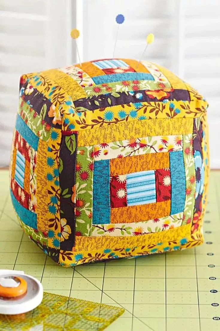 This oversized design can keep all your pins and needles in sight. This design uses a Courthouse Steps quilt pattern to create a beautiful, complex design that is anything but difficult. Get your favorite scraps and give them a try!