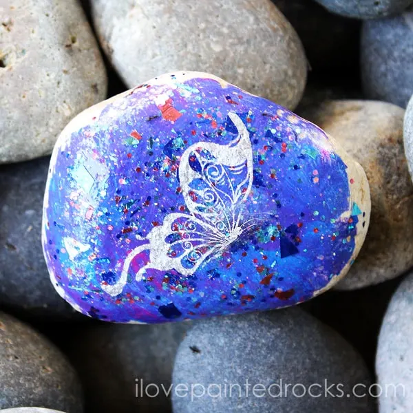 glitter butterfly painted rock idea