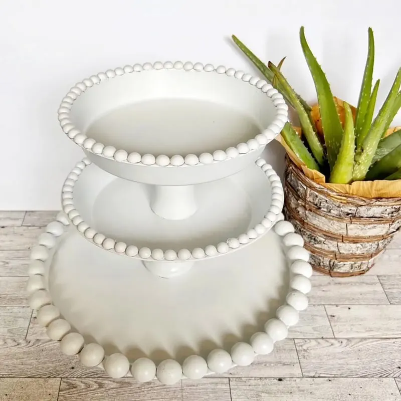 Elevate your desserts display with simple DIY cake stands that you can make yourself. Follow the tutorial from Thrifty Northwest Mom for multiple different designs of elegant and budget-friendly stands for your sweet treats.