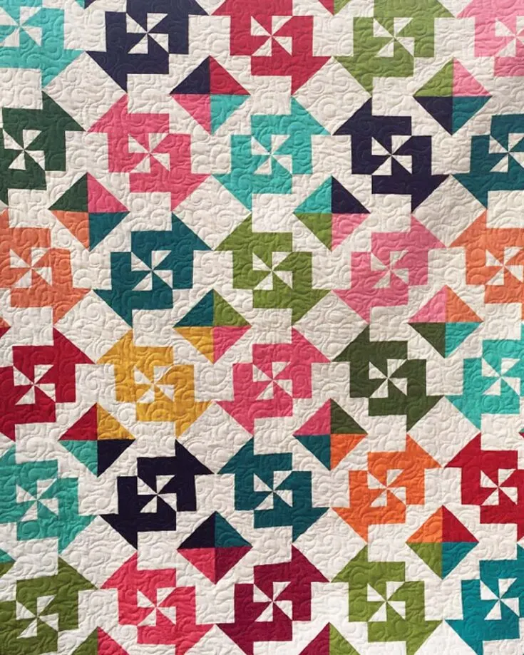 Here&rsquo;s an adorable quilt design that is too cute to resist! The candy swirls quilt pattern is a stunning design with colorful pinwheel blocks made with half-square triangles (HST) and rectangle squares. It&rsquo;s an easy quilting project that is great for quilters of all skill levels and yields a 60&rdquo; x 72&rdquo; quilt size.