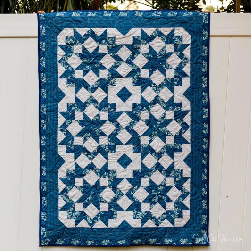 This quilt piece is ideal for intermediate quilters searching for challenging star quilt patterns to try. Isn&rsquo;t she gorgeous? This project will teach you how to make this Carperter&rsquo;s star quilt block and sew it into a throw-sized quilt. This project uses just three yards of fabric for a 41&rdquo; x 57&rdquo; quilt.