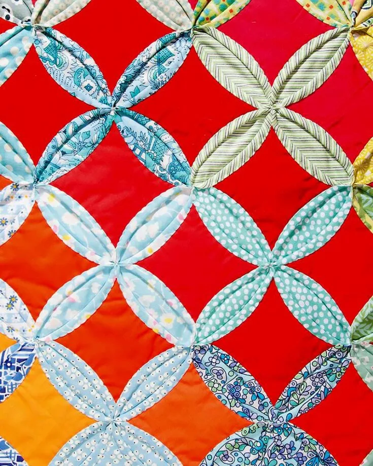 Here's a tutorial on how to complete a cathedral window quilt block! Undoubtedly, we'd suggest you use a contrasting color for the inner piece of fabric to accentuate the enchanting diamond-shaped window. This block pattern might put your origami and hand-stitching skills to the test, but trust the process!