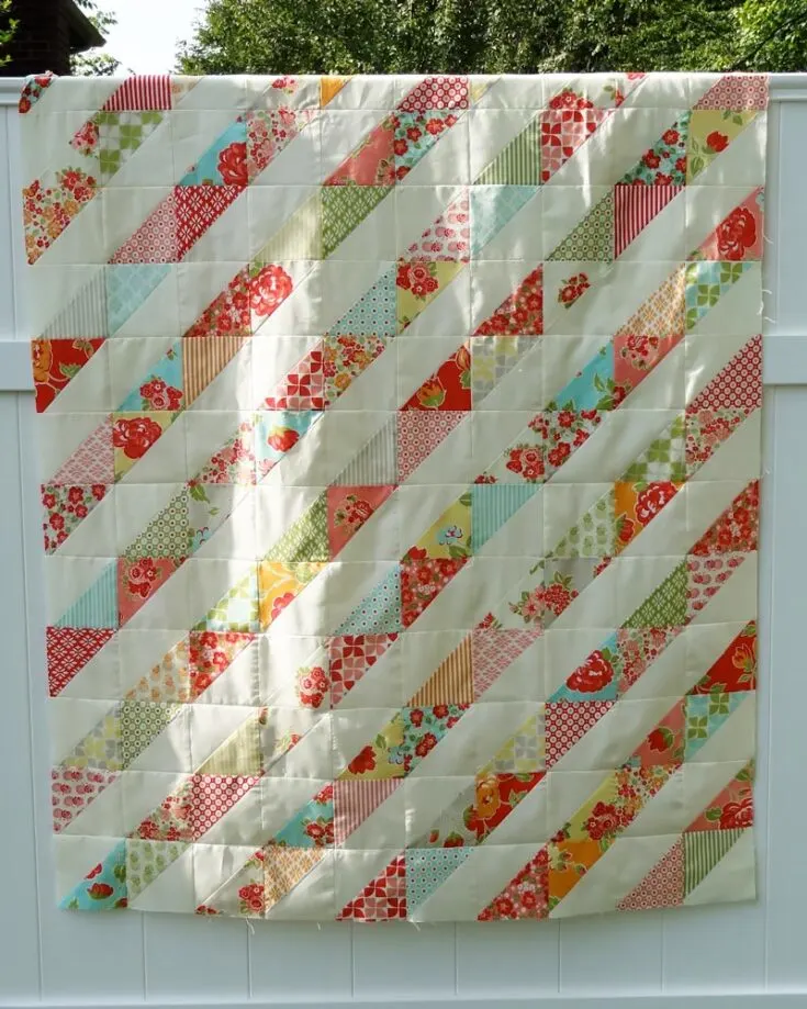 First on the list is this simple yet elegant Charmalade Quilt by Moda Fabrics! To make this quilt, you&rsquo;ll need to prepare your favorite charm pack fabric collection in solids and prints, and with this pattern&rsquo;s helpful instructions, you will also be making 130 half square triangles that will result in a generous 56&rdquo; x 68&rdquo; quilt.