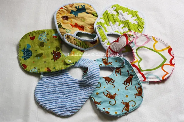 Free pattern & tutorial for making chenille fabric and sewing it into a bib. This bib sewing pattern is a quick project, perfect for a baby shower gift.