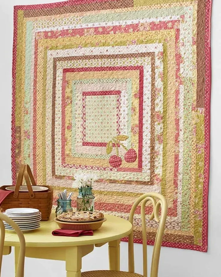 Add a pop of sweetness to your space with this delightful wall quilt pattern! Grab your favorite floral jelly roll strips and add a touch of cherry-inspired joy to your fabric as you quilt away. This is precisely what you&rsquo;ll need to pass the time and get into the quilting hobby. Size: 55 &frac12;&rdquo; x 60 &frac12;&rdquo;