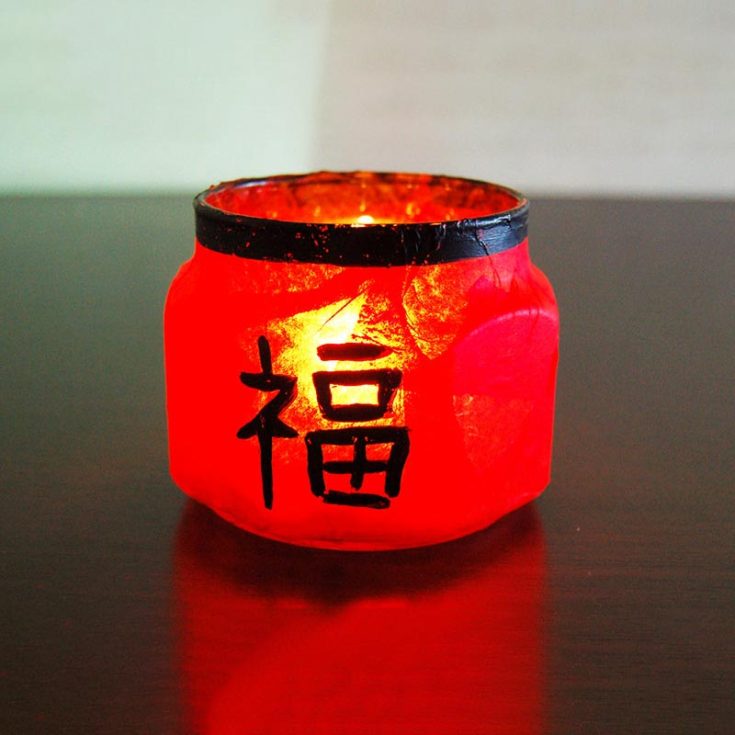Enjoy the delightful aroma of a candle glowing warmly in this beautiful handmade Candle Holder! Featuring a Chinese character design on the glass jar, it brings a festive touch to your space. Add a Chinese New Year-inspired scent to complete the cozy, aromatic ambiance.
