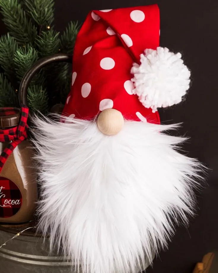 Christmas Santa gnomes are a festive twist on the classic gnome! With just a few simple tweaks, like a change of color scheme and a different beard style, you can transform a traditional gnome into a jolly Santa.