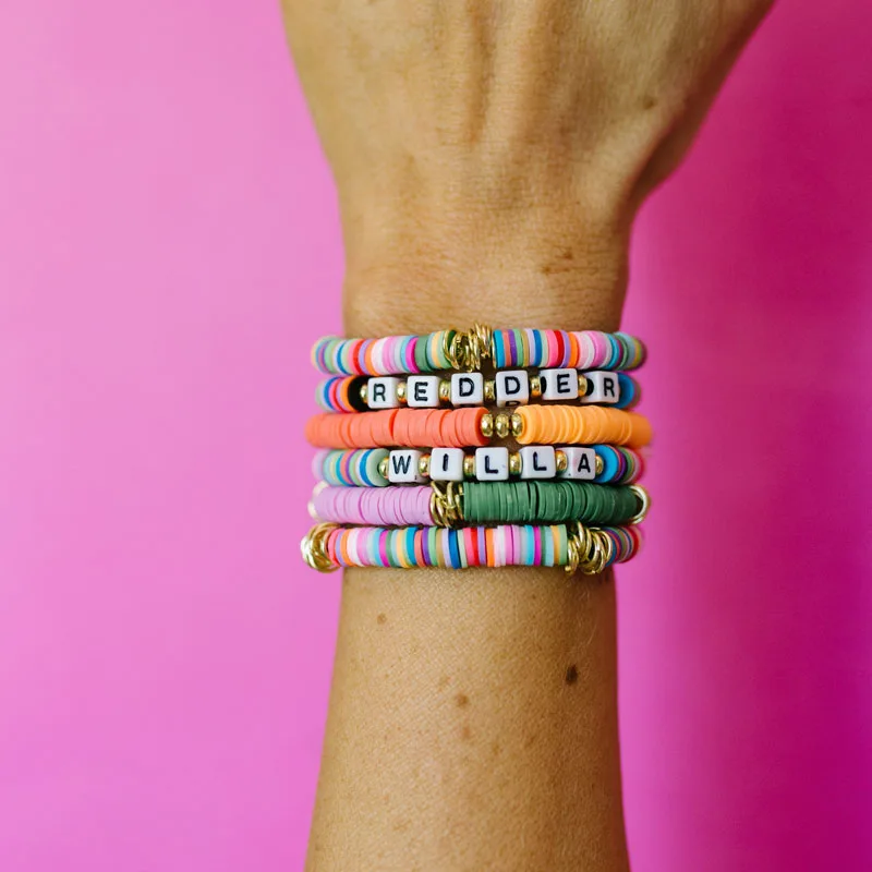 Learn to make a DIY clay bead bracelet with this tutorial! They're so fun to make, perfect for kids and adults. Pair it with letter beads to spell out your name, or decorate it with gold accents to make it extra personalized.