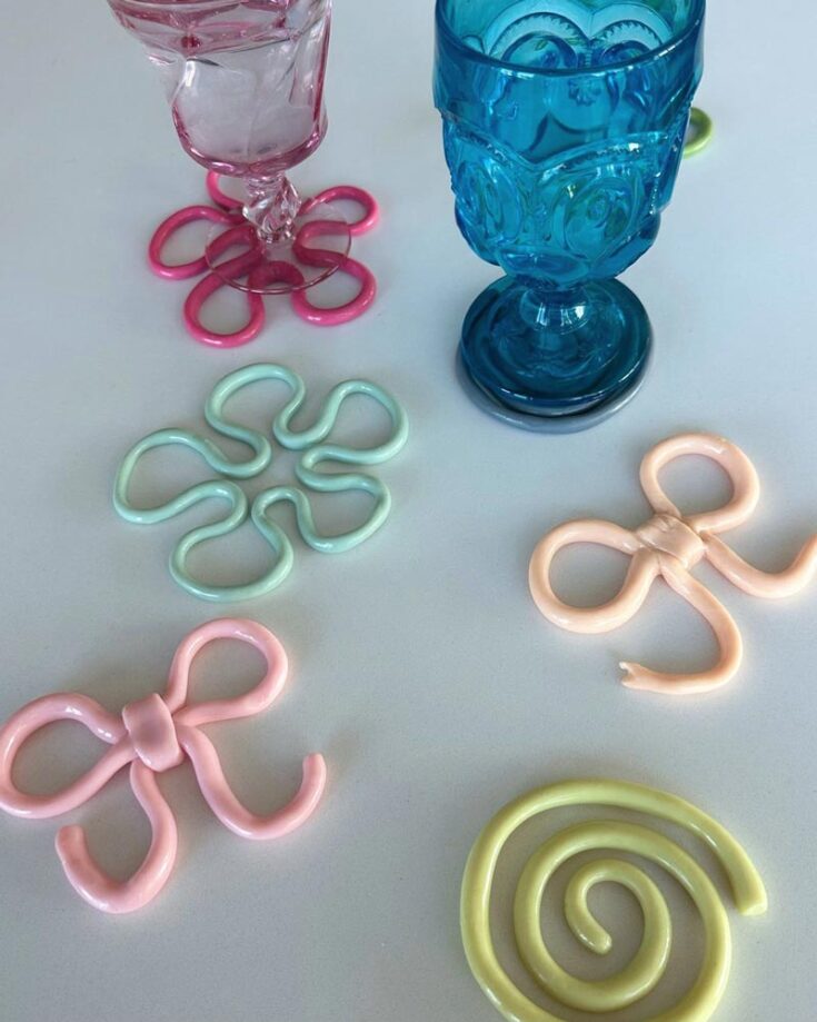 DIY coasters can be something other than traditional squares or circles. Explore your creativity by shaping clay clay into ribbons, swirls, and flowers, turning everyday coasters into eye-catching art pieces.