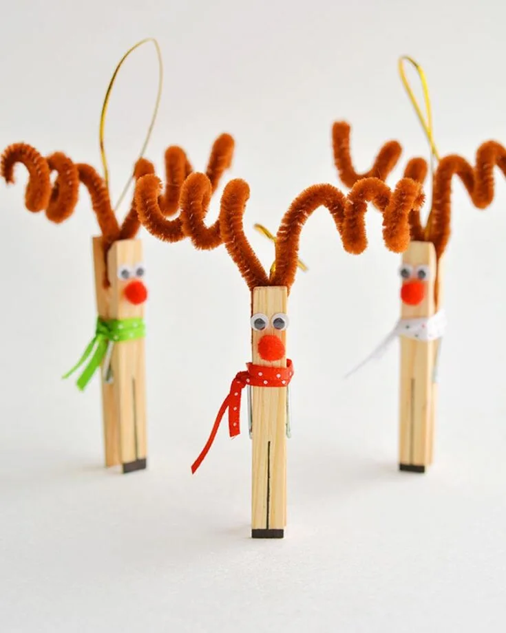 Create adorable reindeer ornaments using clothespins and pipe cleaners. With their fuzzy antlers and red noses, these festive crafts are perfect for decorating the tree or gifts.