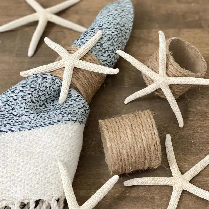 These lovely coastal napkin rings are the perfect addition to a summer table setting! They&rsquo;re super easy and budget-friendly to make, and they add such a personal touch to your table setting. Plus, they&rsquo;re great conversation starters and can be crafted using simple things like cardboard tubes from paper towels and pretty seashells you collected.