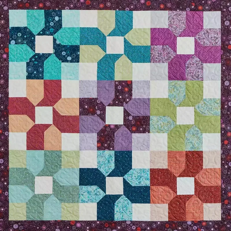 Are you looking to spruce up your bedroom decor with a splash of vibrant colors? Then try out this lovely Color Burst Quilt design that uses various precut prints in dark, medium, and light! The finished size of this gorgeous piece is 60 &frac12;" x 60 &frac12;".&nbsp;
