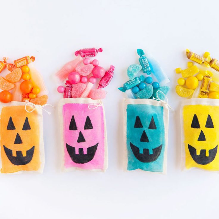 Halloween&rsquo;s color scheme isn&rsquo;t limited to just orange and black. These colorful treat bags burst with colorful fun and are perfect for any Halloween party! Plus, the jack-o&rsquo;-lantern faces are sure to get the spooky message across!