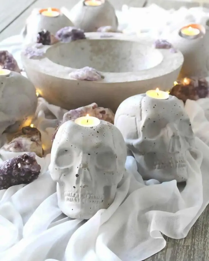 Here is a bone-rattling craft for your dining area. Get ready to light up this Halloween night with these easy Halloween Concrete Skull Candle Holders. These add a rustic touch to your space while being spooky simultaneously!