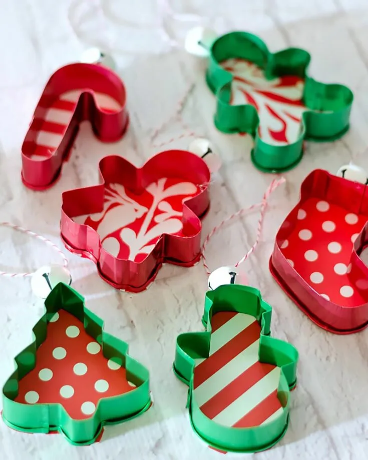 Turn your cookie cutters into adorable ornaments with supplies you can grab from the Dollar Tree! This budget-friendly and fun DIY adds a splash of color and creativity to your Christmas tree, making it extra festive and unique.