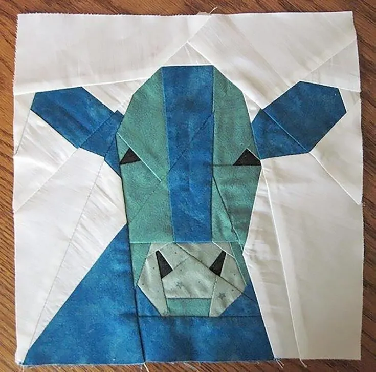 If you're skilled at paper piecing quilt blocks, this cow FPP project should be a worthy challenge.